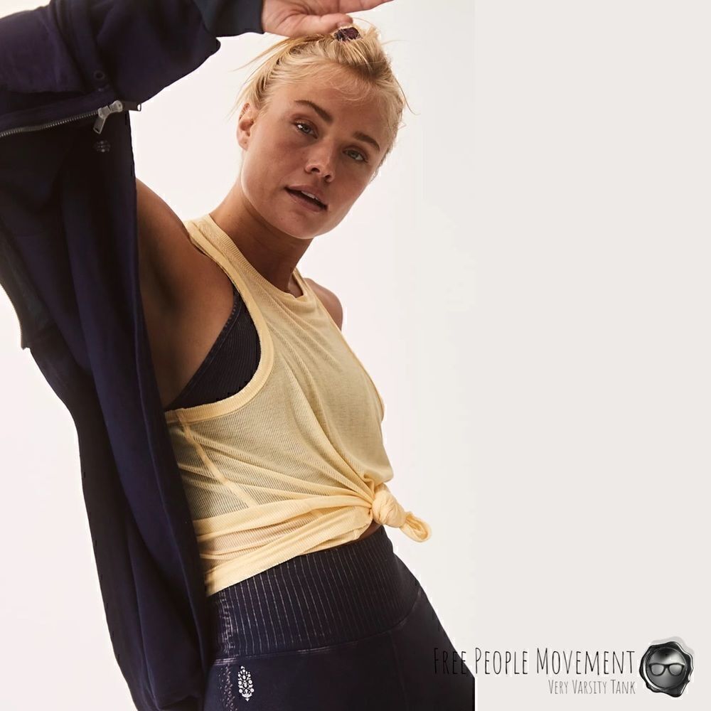 FREE PEOPLE MOVEMENT VERY VARSITY TANK IN MAGNOLIA  BUTTERCREAM YELLOW SMALL